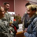 US service members dine with French families