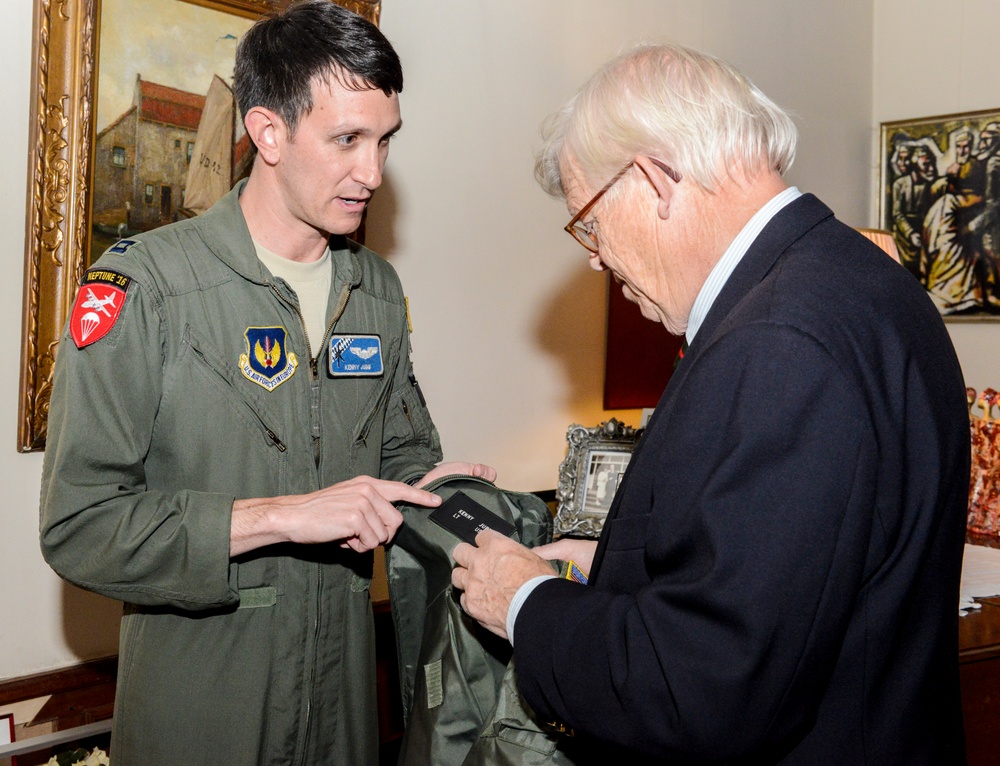 US service members dine with French families