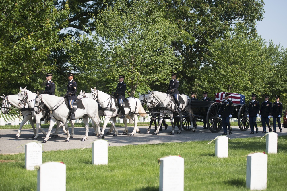 The graveside service for U.S. Army Capt. Stephanie Rader in Arlington National Cemetery