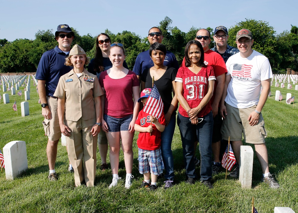 Ford Sailors plant flags for fallen service members