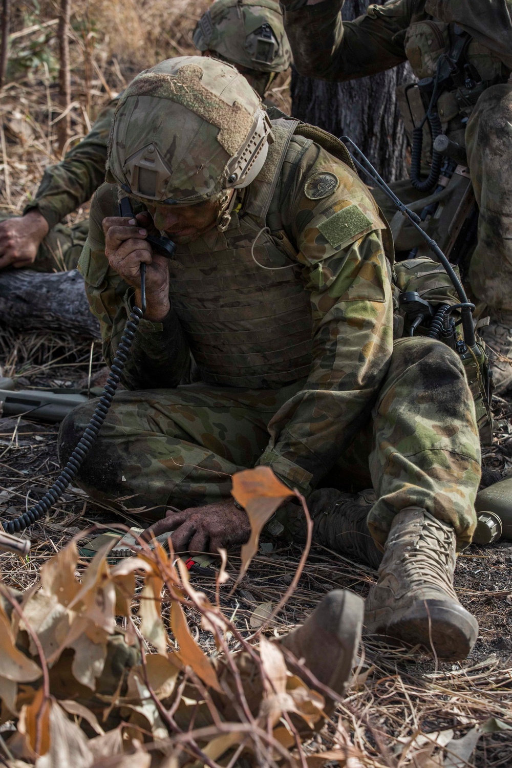 Members of the Australian Army perform synchronized combat arms training