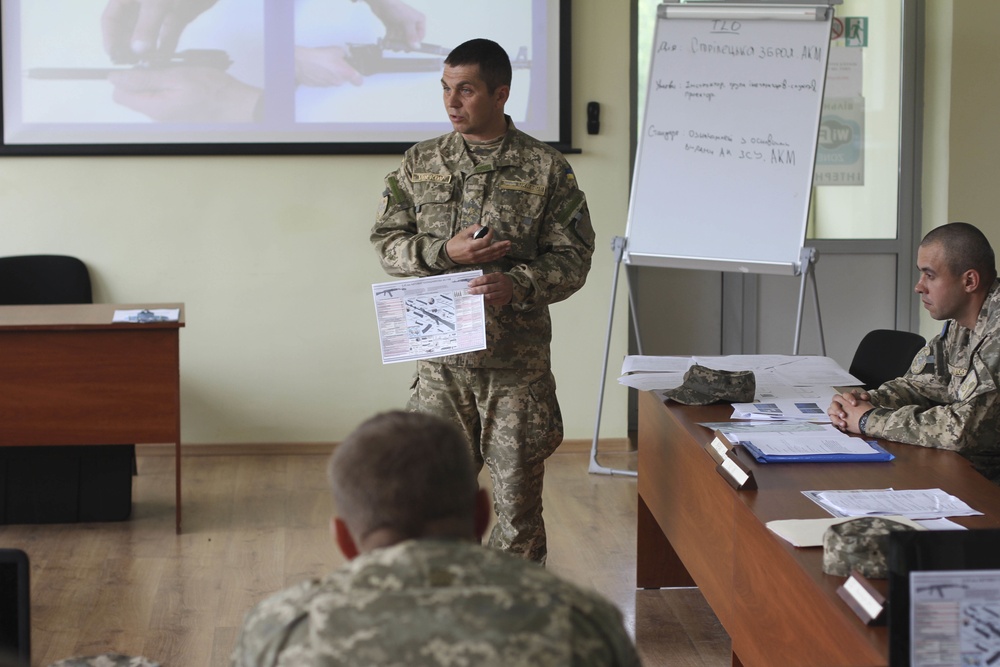 A Ukrainian Soldier practices teaching a class