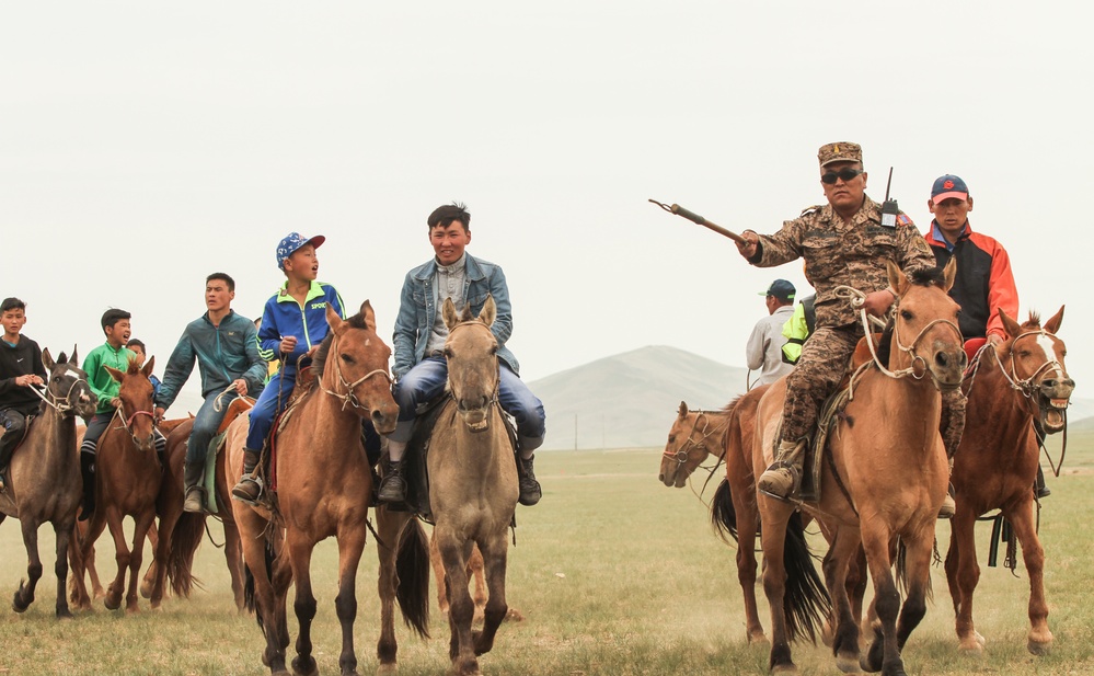 Multionational servicemembers participate in a Naadam Festival during Khaan Quest 2016.