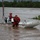 First Responders dismount boat First Responders dismount boat