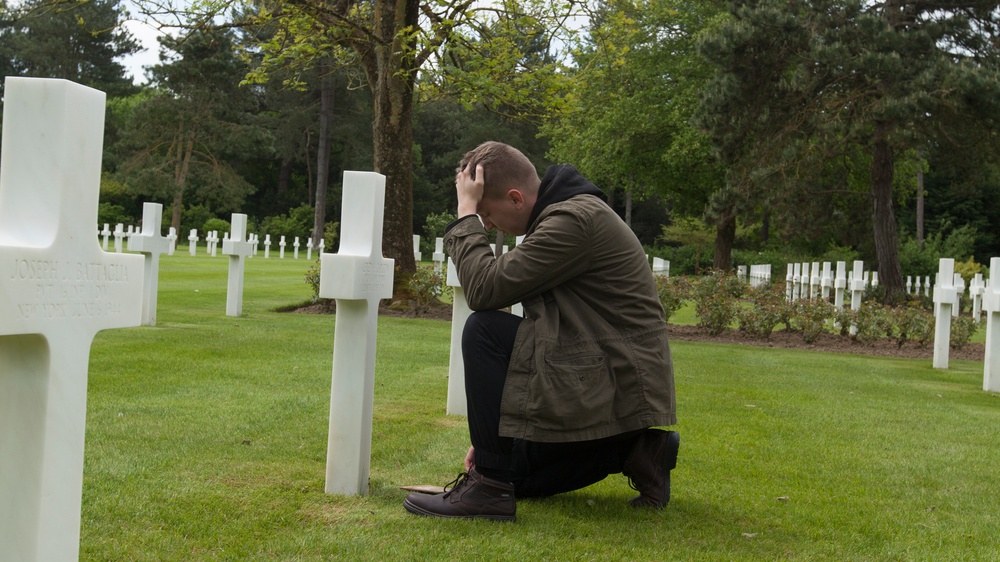 Marine visits gravesite of WWII family hero
