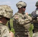 A 3-15 Soldier leads an after action review