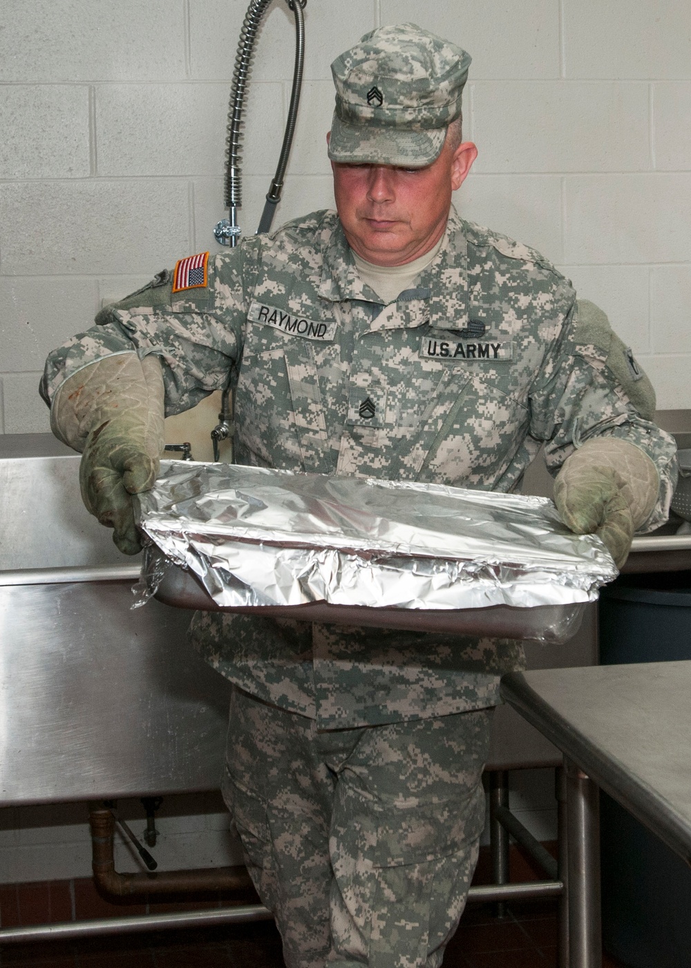 Soldiers Moves Dish to Oven