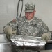 Soldiers Moves Dish to Oven