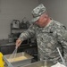 Soldier Prepares Scalloped Potatoes