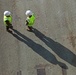 Marines move gear from ship to convoy