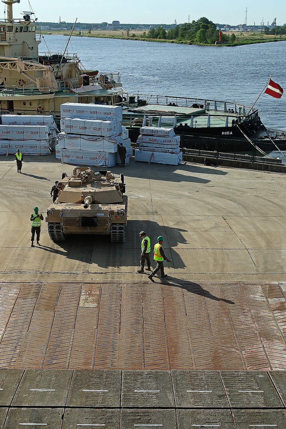 Marines move gear from ship to convoy