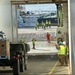 Marines move gear from ship to convoy