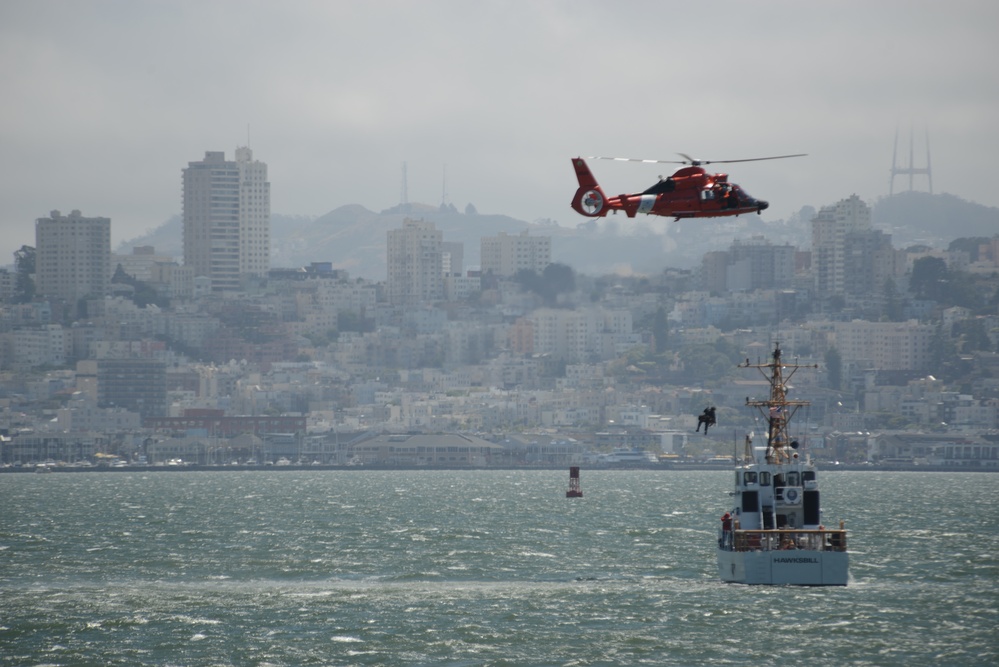 Petty Officer 1st Class Chris Hartman and his K9 Evy demonstrate a vertical delivery