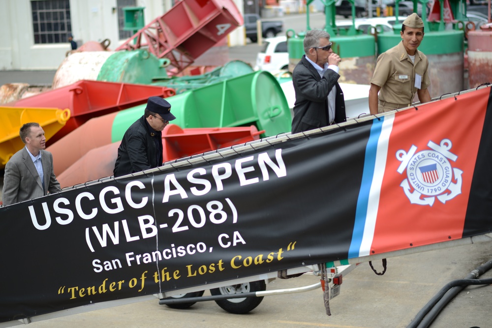 Attendees of the 19th semi-annual Multi-lateral Maritime Counter Drug Seminar walk across the brow of the USCGC Aspen