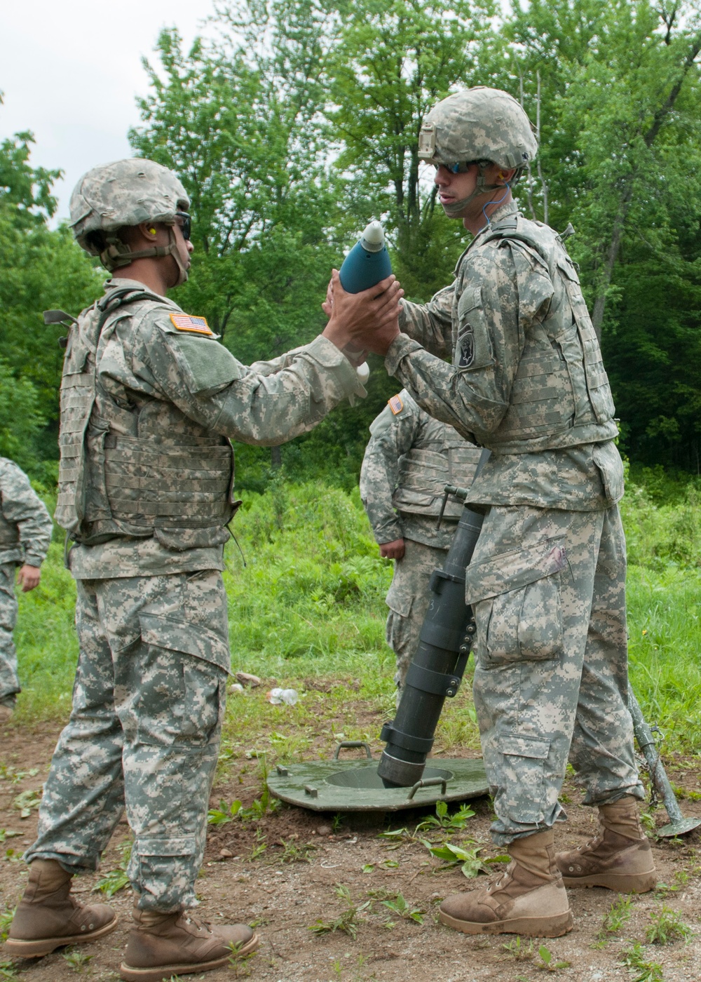 Mortar Man Passes Round for Fire