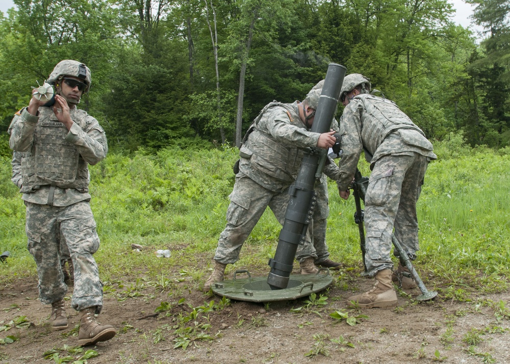 Mortar Men Ready 120-mm Mortar for Fire