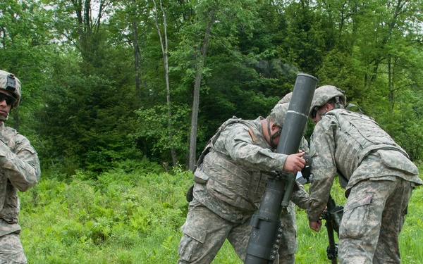 Mortar Men Ready 120-mm Mortar for Fire