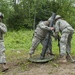 Mortar Men Ready 120-mm Mortar for Fire