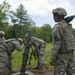 Mortar Man Stands Ready as Soldiers Aim 120-mm Mortar