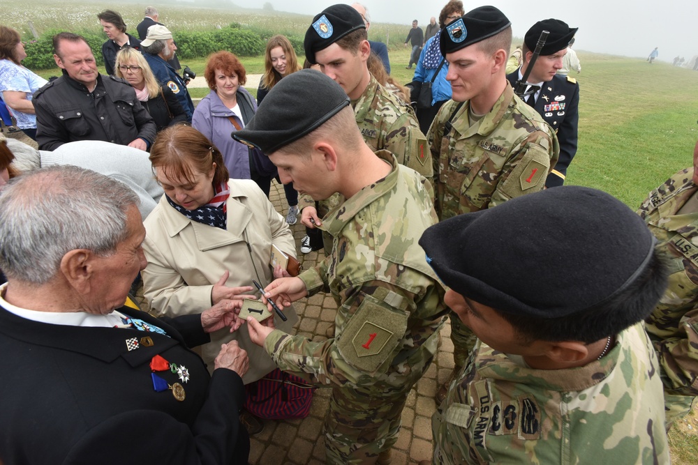 Big Red One WWII Medic signs Soldiers' patches