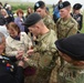 Big Red One WWII Medic signs Soldiers' patches