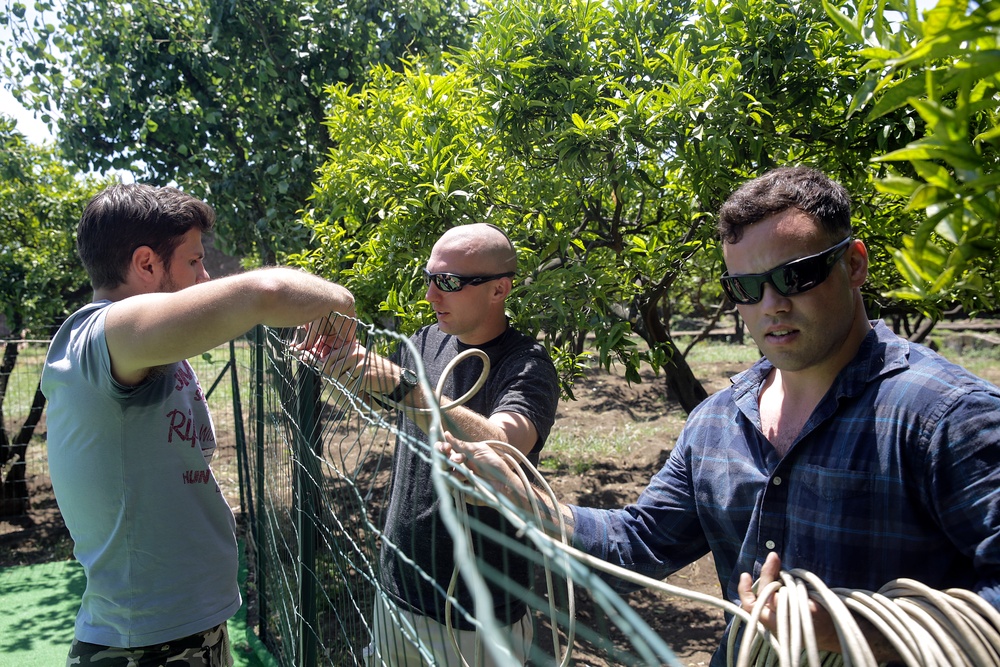 Marines show care for Italian orphanage