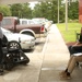 Sgt. Kelby Price presented with Action Trackchair
