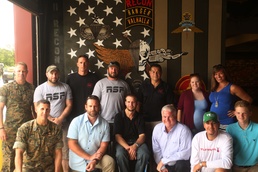 Sgt. Kelby Price presented with Action Trackchair