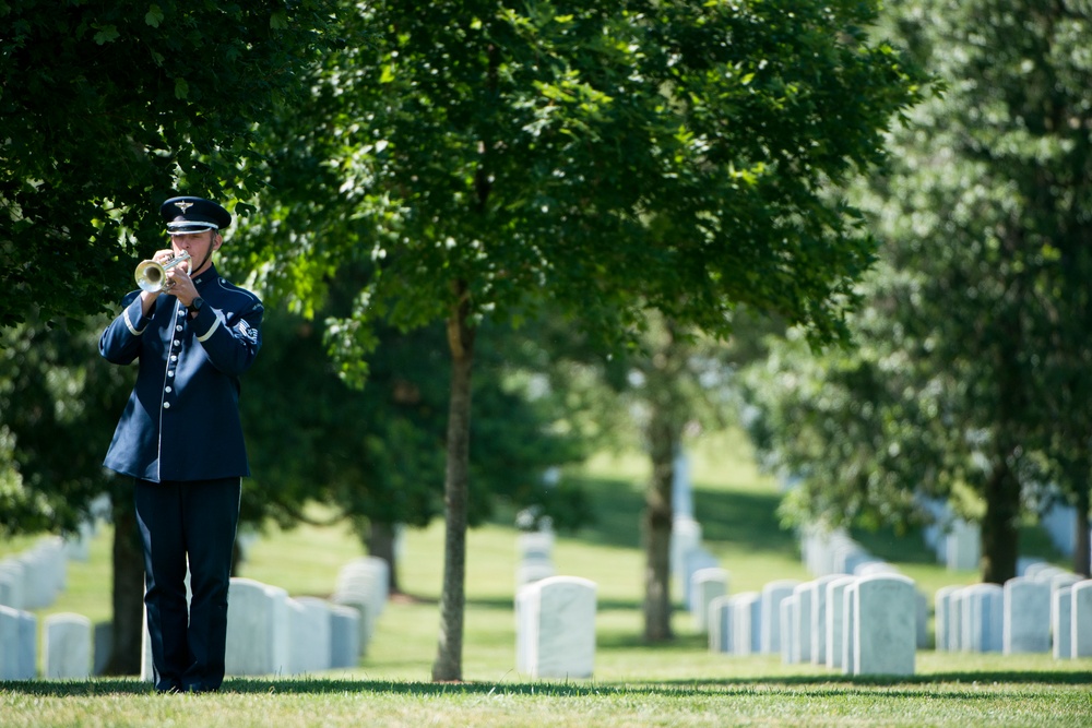 The graveside service for 2nd. Lt. Malvin Greston &quot;Marvelous Mal&quot; Whitfield, Tuskegee Airman and five-time Olympic medalist, at Arlington National Cemetery