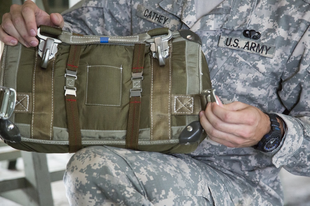 U.S. Army paratroopers jump from a balloon in Belgium