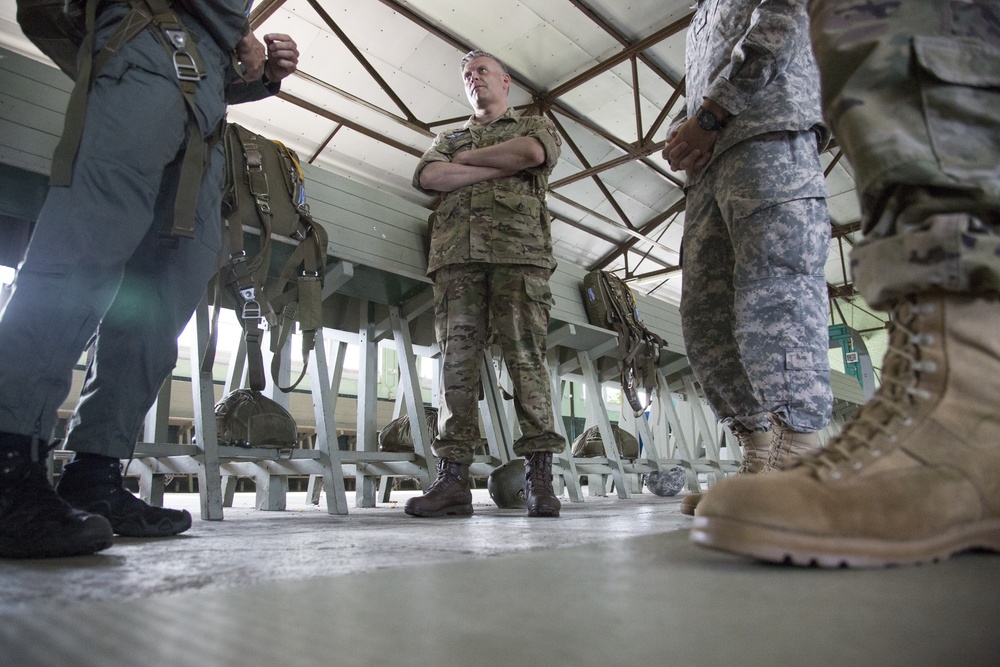 U.S. Army paratroopers jump from a balloon in Belgium