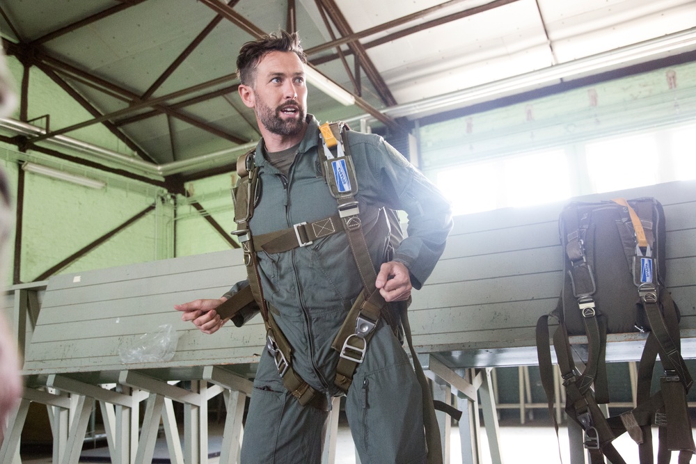 U.S. Army paratroopers jump from a balloon in Belgium