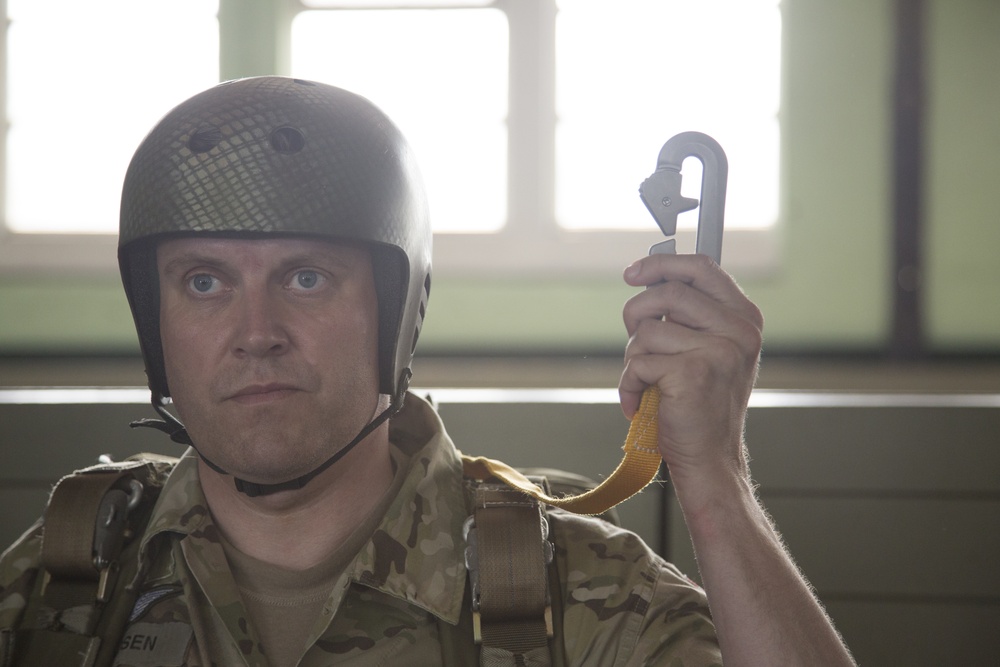 U.S. Army paratroopers jump from a balloon in Belgium