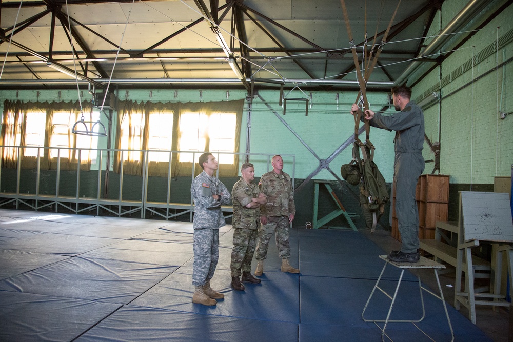 U.S. Army paratroopers jump from a balloon in Belgium