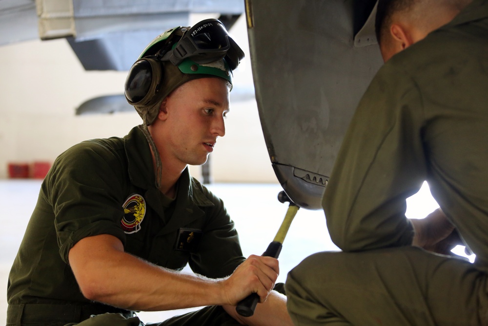 VMAT-203 Maintainers go to work on Harriers