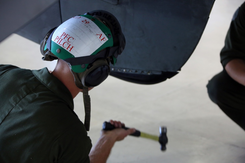 VMAT-203 Maintainers go to work on Harriers