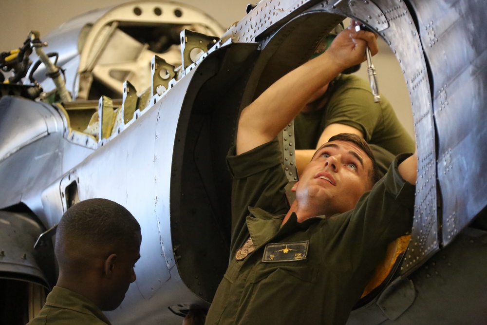 VMAT-203 Maintainers go to work on Harriers