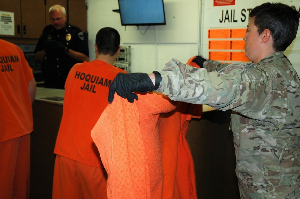 Army National Guard MPs rehearse tsunami jail evacuation with Hoquiam Police Department