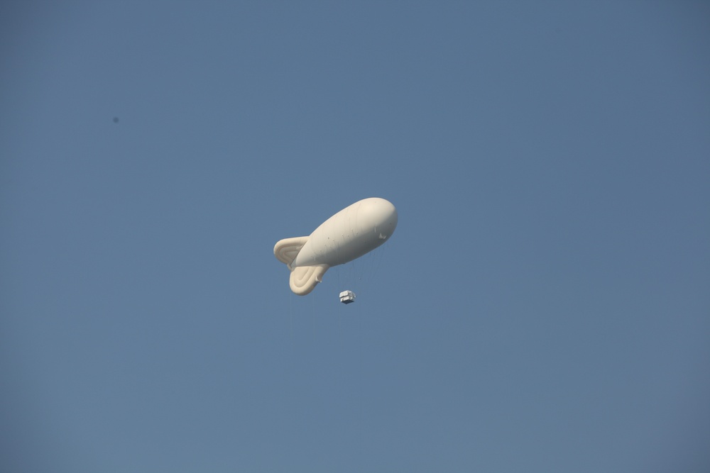 U.S. ARMY PARATROOPERS JUMP FROM A BALLOON IN BELGIUM