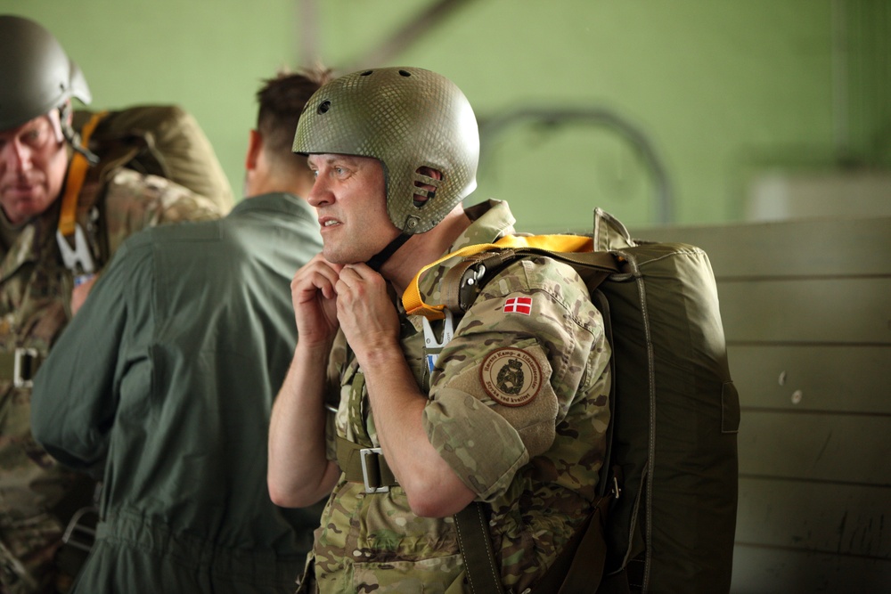 U.S. ARMY PARATROOPERS JUMP FROM A BALLOON IN BELGIUM