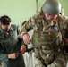 U.S. ARMY PARATROOPERS JUMP FROM A BALLOON IN BELGIUM