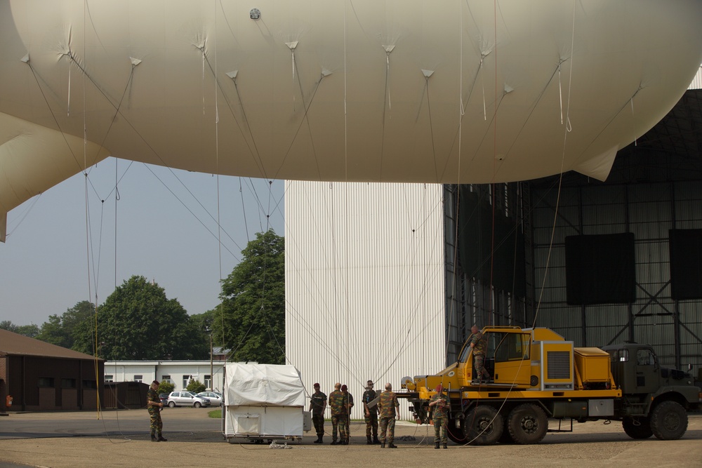 U.S. ARMY PARATROOPERS JUMP FROM A BALLOON IN BELGIUM