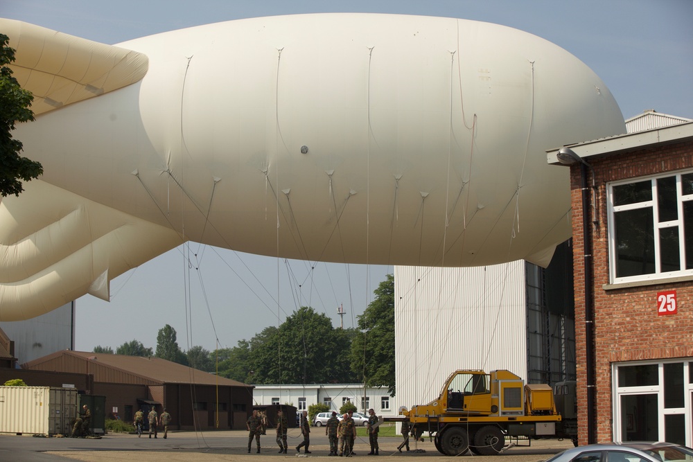 U.S. ARMY PARATROOPERS JUMP FROM A BALLOON IN BELGIUM