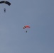 U.S. ARMY PARATROOPERS JUMP FROM A BALLOON IN BELGIUM