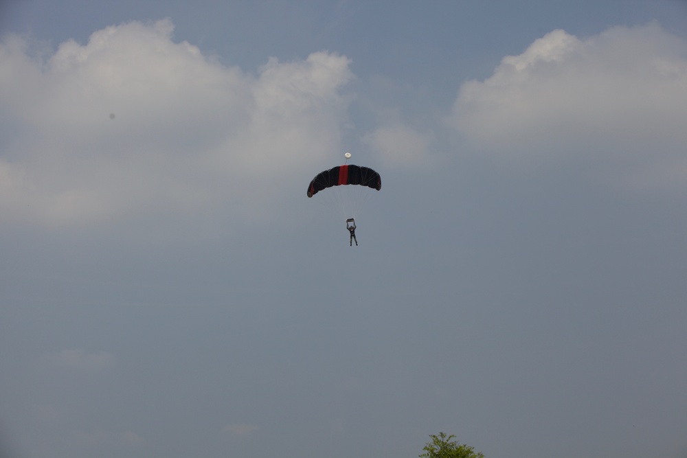 U.S. ARMY PARATROOPERS JUMP FROM A BALLOON IN BELGIUM