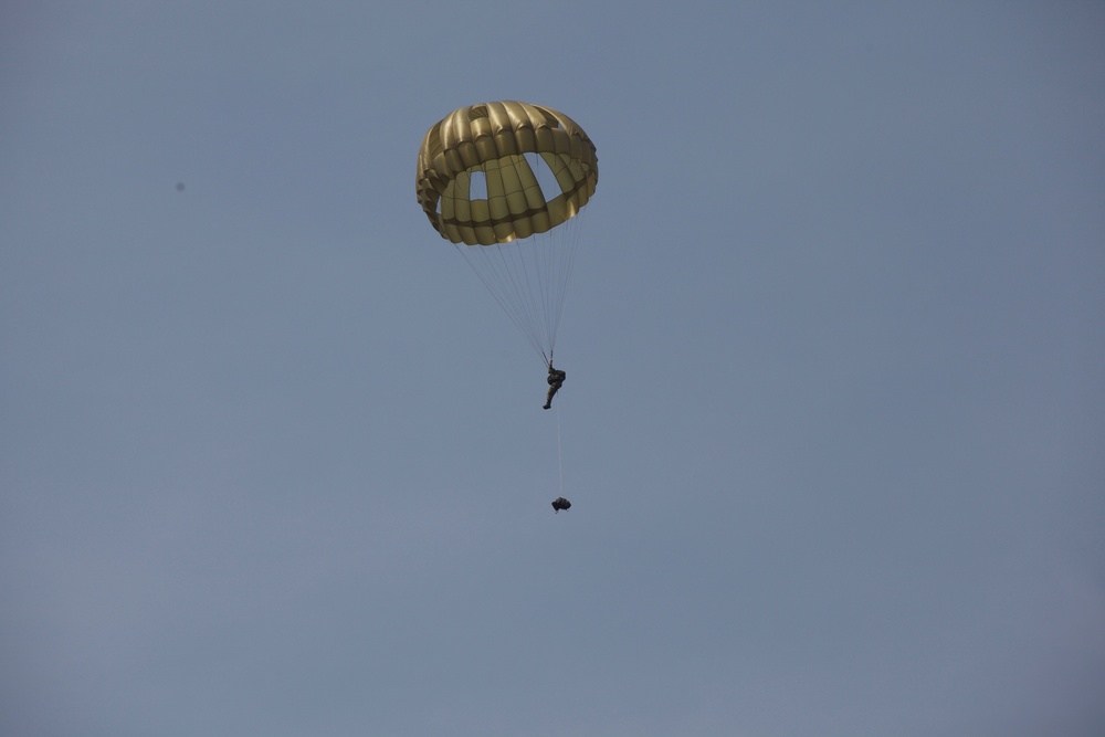 U.S. ARMY PARATROOPERS JUMP FROM A BALLOON IN BELGIUM