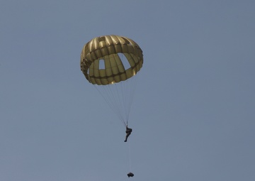 U.S. ARMY PARATROOPERS JUMP FROM A BALLOON IN BELGIUM