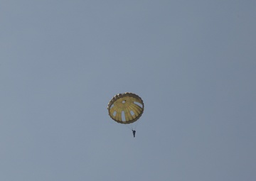 U.S. ARMY PARATROOPERS JUMP FROM A BALLOON IN BELGIUM