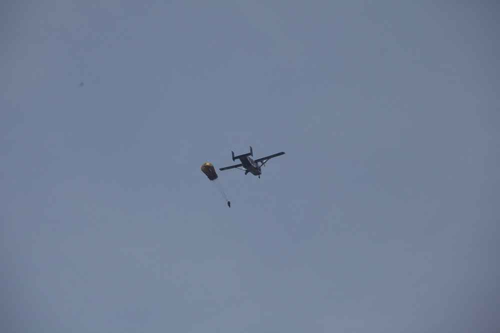 U.S. ARMY PARATROOPERS JUMP FROM A BALLOON IN BELGIUM