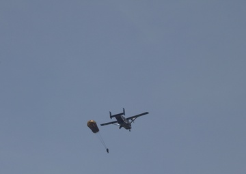 U.S. ARMY PARATROOPERS JUMP FROM A BALLOON IN BELGIUM